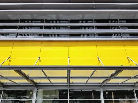 Low Angle View of Yellow Building Facade Stock Photos