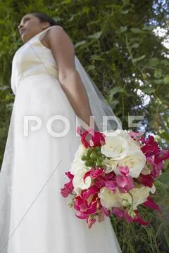 Low angle view of young bride Stock Photos