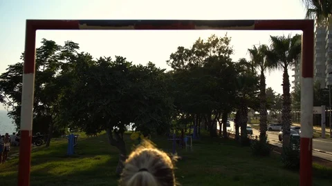 Low angle view of young female doing chin-ups Stock Footage 94114453