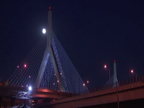 Low angle view of Zakim Bunker Hill Bridge under full moon Stock Footage 86750286