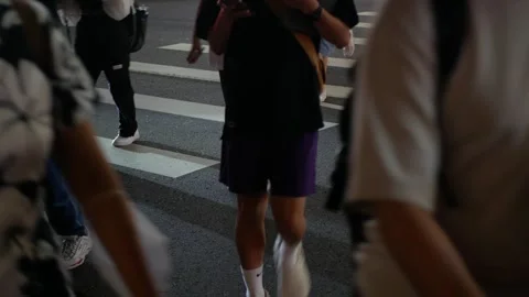 Low angle view to the at zebra crossing area at intersection while people p.. Stock-Footage 308997795