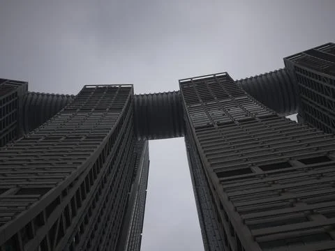 Low-angle views of curving twin towers and stacked highrise facades, China Stock Photos