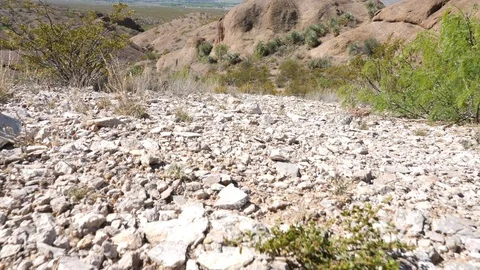 Low Angle Walk Through Stones and Rock on Mountain Stock Footage 112883972