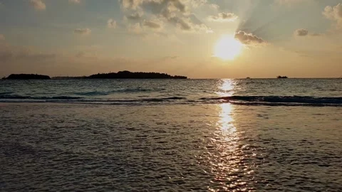 Low angle walk toward seashore in Maldives at dusk, slow motion Видео 279840431