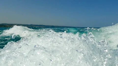 Low-angle water surface pov of motorboat wake trail, slow-motion Stock Footage 279425102