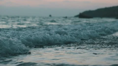 Low Angle Waves Break On White Sand Beach At Sunset Stock Footage 171902026