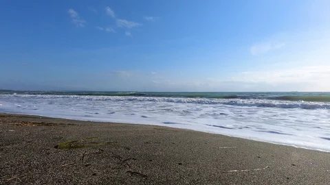 Low angle waves time laps Video stock 96570616