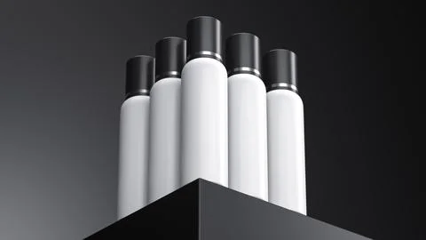 Low Angle White silver cosmetic spray bottles set composition isolated on B.. Stock Photos