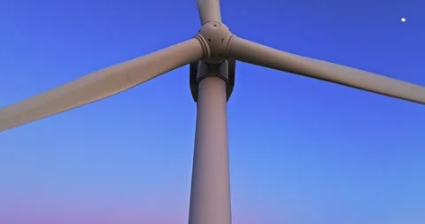 Low Angle Of Wind Turbine Generator On Vibrant Blue Sky Backdrop Steady Shot Stock Footage 289413585