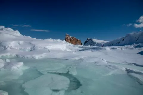 Low angle winter shot of the Perce Rock. Stock Photos