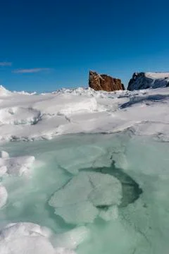 Low angle winter shot of the Perce Rock. Stock Photos