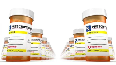Low angled front view of endless Pill Bottles Foto stock