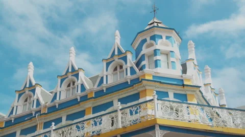 Low angled medium Close-up of top of building in Long Street Stock Footage 310386284
