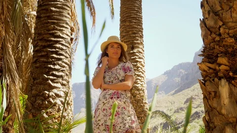 Low Angled Shot of a Beautiful Model with a View of the Valley in Background 스톡 동영상 116561283
