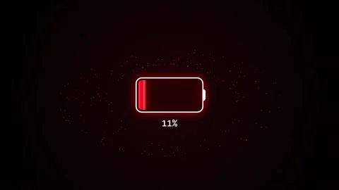 Low battery warning indicator with red glowing percentage counter on black .. Stock Footage 346241684