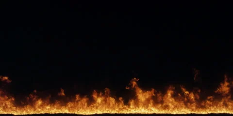 A low blaze becomes a frame-filling inferno as gas explosions erupt at right and Stock Footage 59124976