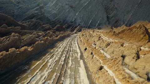 Low camera moves through rocky facies Stock Footage 112295046