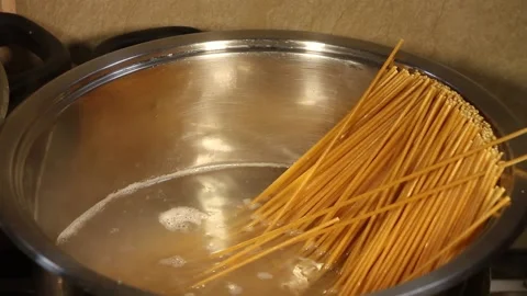 Low carb spaghetti pasta in boiling water Stock Footage 156027397