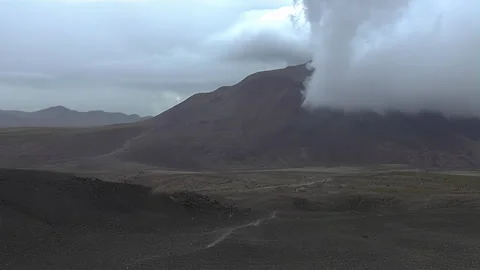 Low Clouds Advancing Across Arid Mountain Terrain Video stock 332252128