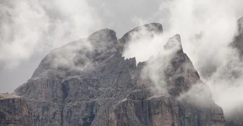 Low clouds among  the Piz Duleda Puez Group peaks in Dolomites area Stock Photos