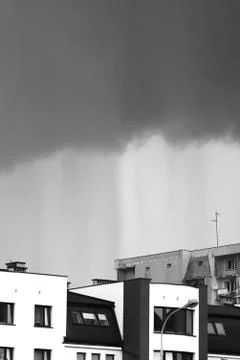 Low clouds and rainfall Virga over blocks of flats. 스톡 사진