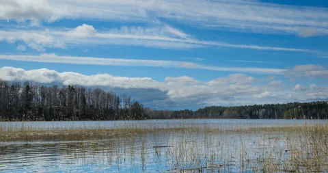 Low Clouds are flying over the lake. Stock Footage 107864165