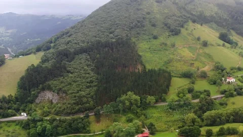 Low clouds around the mountainous massif of Amboto in Urkiola Basque Country Stock Footage 148287534
