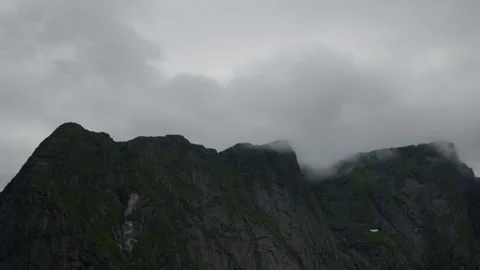Low Clouds Brushing Dark Mountain Peaks in Norway Lofoten Stock Footage 340916944