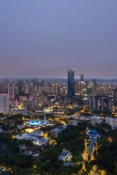 Low clouds drape over the city Stock Photos