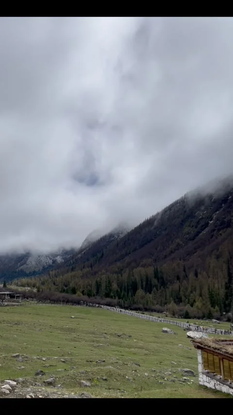 Low clouds drifting over mountain valley in Sichuan, China Stock Footage 337819949