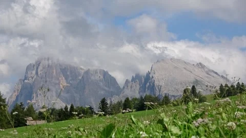 Low clouds enveloping the mountains. Sassolungo, Langkofel mountain and Sas.. Stock Footage 247317439