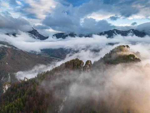 Low clouds flowing through Mala Fatra mountains with Velky Rozsutec, Slovakia Fotos de archivo