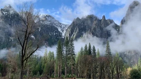 Low Clouds in Front of Granite Mountains in Yosemite National Park Stock Footage 131988673