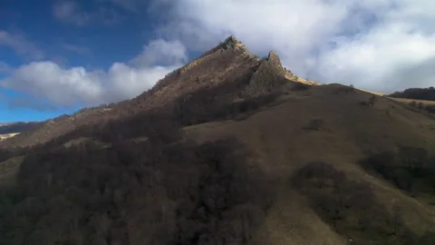 Low clouds in the mountains. Aerial view of low fog in mountainous area Stock Footage 241011218