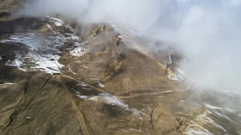Low clouds in the mountains. Aerial view of low fog in mountainous area Stock Footage 241011227