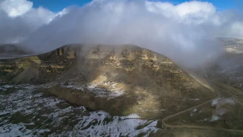 Low clouds in the mountains. Aerial view of low fog in mountainous area Stock Footage 241032490