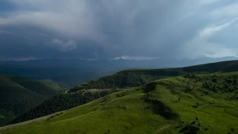 Low clouds in the mountains. Aerial view of low fog in mountainous area Stock Footage 241185552