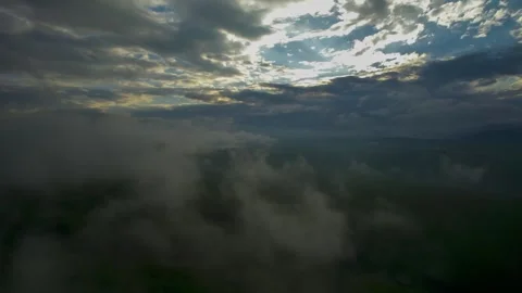 Low clouds in the mountains. Aerial view of low fog in mountainous area Stock Footage 241185889