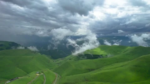 Low clouds in the mountains. Aerial view of low fog in mountainous area Video stock 250980247