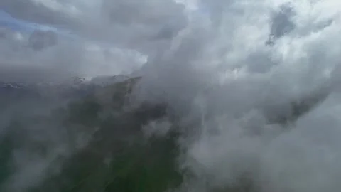 Low clouds in the mountains. Aerial view of low fog in mountainous area Video stock 251064981