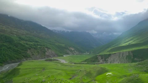 Low clouds in the mountains. Aerial view of low fog in mountainous area Stock Footage 251127400