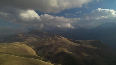 Low clouds in the mountains. Aerial view of low fog in the highlands. Stock Footage 319446941