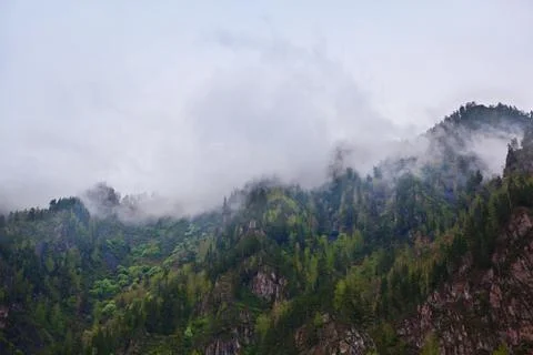 Low clouds in the mountains Stock Photos
