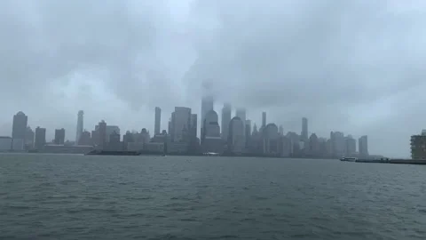 Low clouds obscure top of skyline New York City / Manhattan on stormy day Video stock 137276864