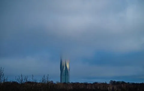 Low clouds obscuring the upper floors of Karlatornet high rise Stock Photos