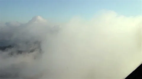 Low Clouds over Island Forest - Aerial Stock Footage 43180486