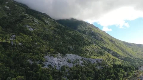Low clouds over the mountains from a drone Stock Footage 257090083