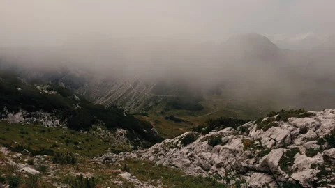 Low Clouds Over Rocky Mountains in the Slovenian Alps Vidéo 347985522