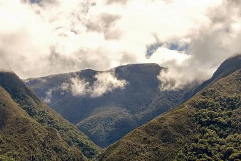 Low clouds partially cover the top of the Paramo Chontales mountains in the s Stock Photos