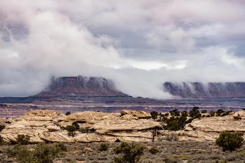 Low Clouds Spill Over The White Rim Fotos de archivo